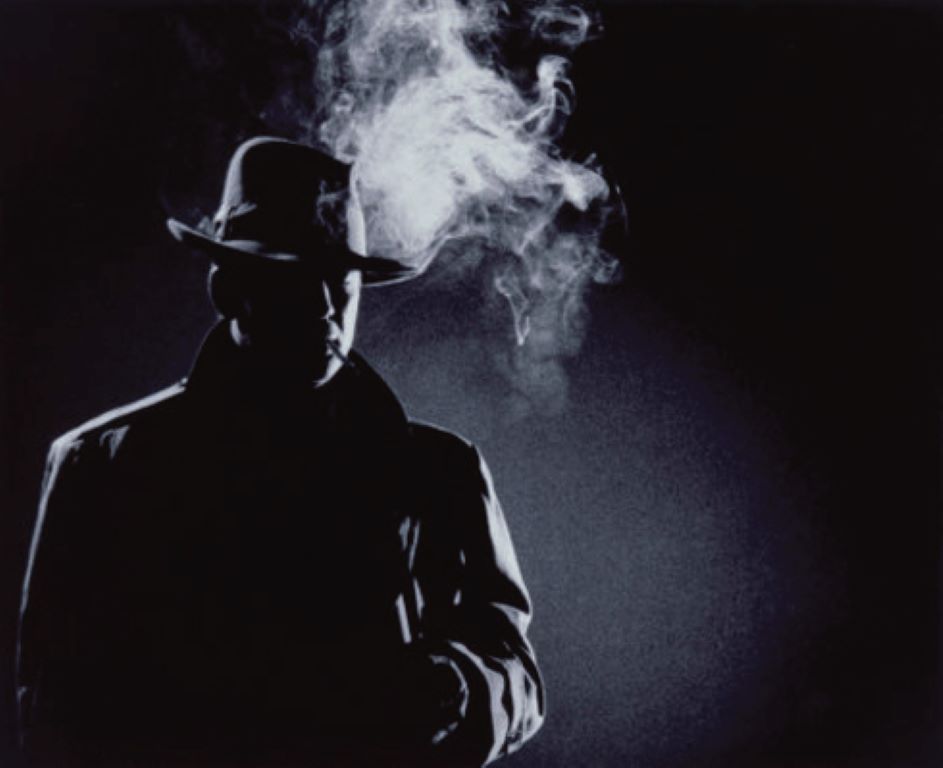 Black and white noir detective in smoke